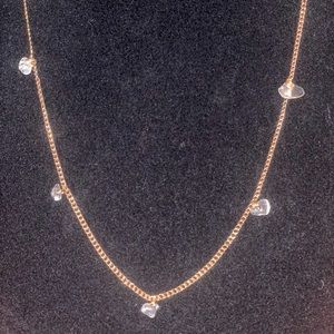 Gold necklace with clear rock beads